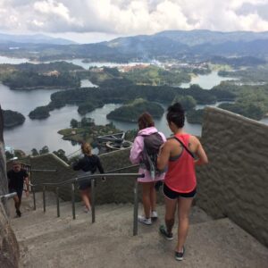a group in a private Guatape tour at the top of the peñol rock
