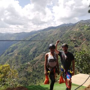 Couple enjoying zip line near Medellín